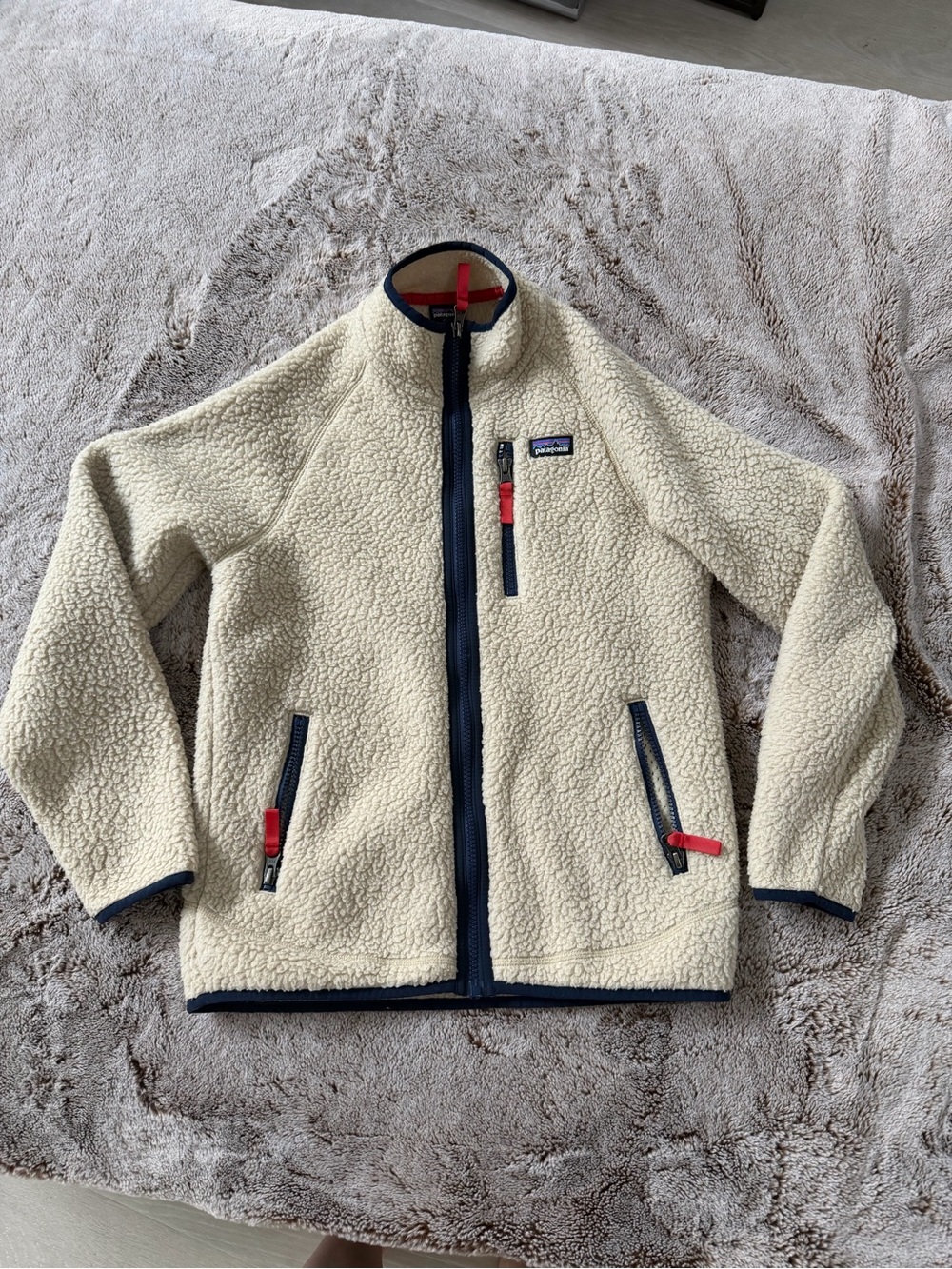 Patagonia Kids Cream Sherpa Jacket with Navy Trim and Red Accents
